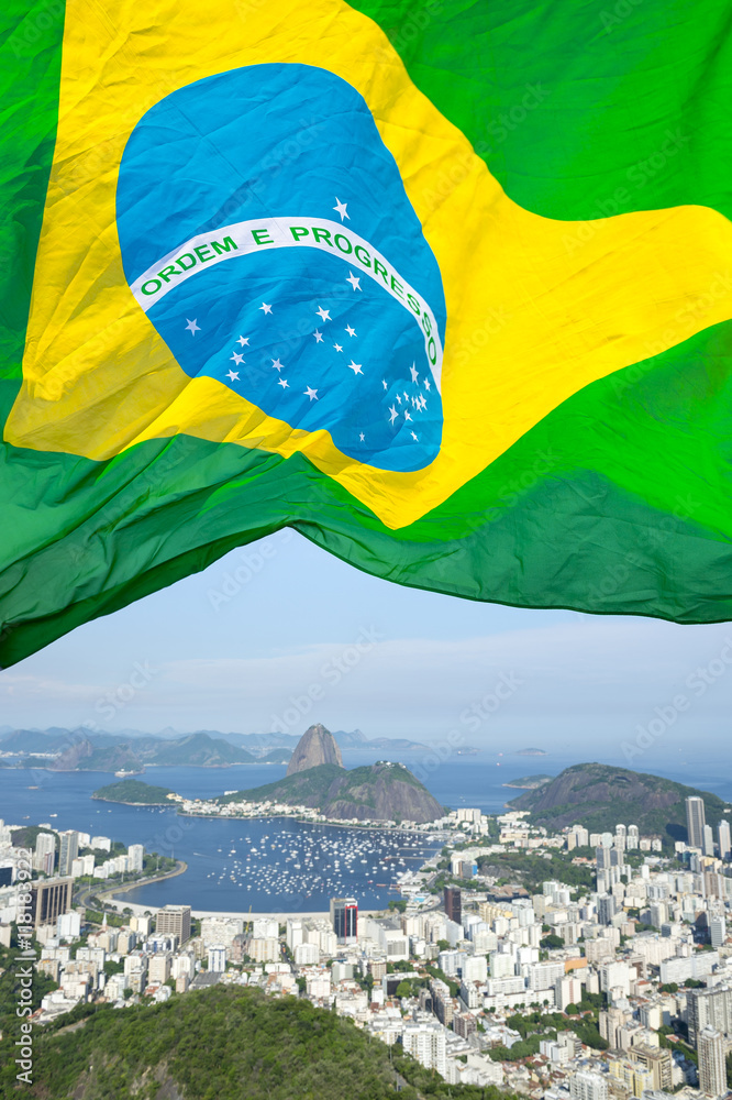 Brazilian Flag Flying Above A Scenic Overlook Of The Rio De Janeiro City Skyline With Sugarloaf Mountain Botafogo And Guanabara Bay Stock Photo Adobe Stock