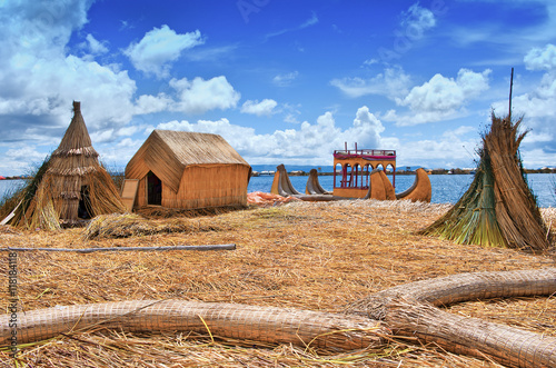Traditional village on  Uros islands on lake Titicaca in Peru photo