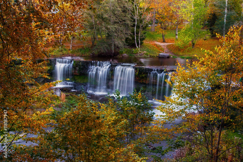 Golden autumn. Waterfall Keila - Joa top view. Attraction in Estonia. Autumn.