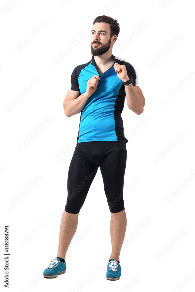 Φωτογραφία Tired young cyclist unzipping his sports cycling jersey t-shirt