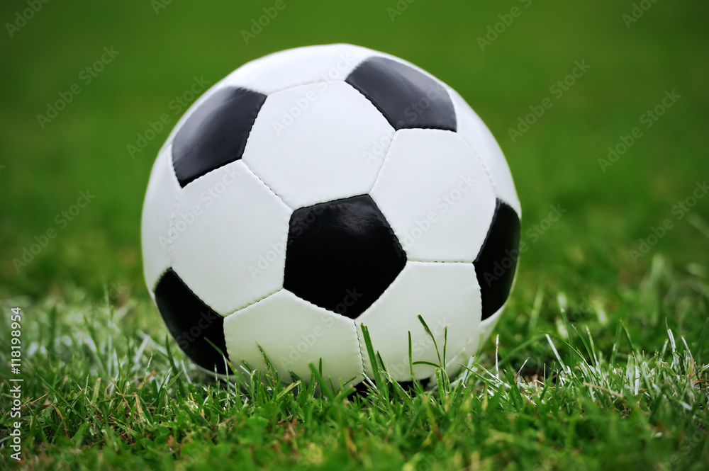 Soccer ball on green grass