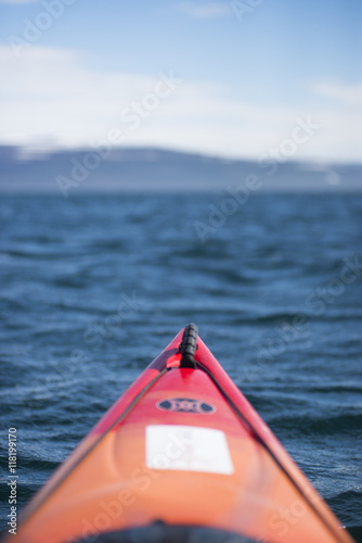Red and Orange Kayak in Bay
