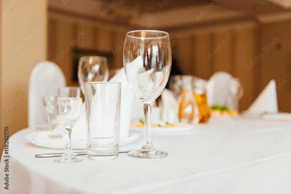 Wedding glasses filled with champagne at banquet Wedding glasses filled with champagne at banquet