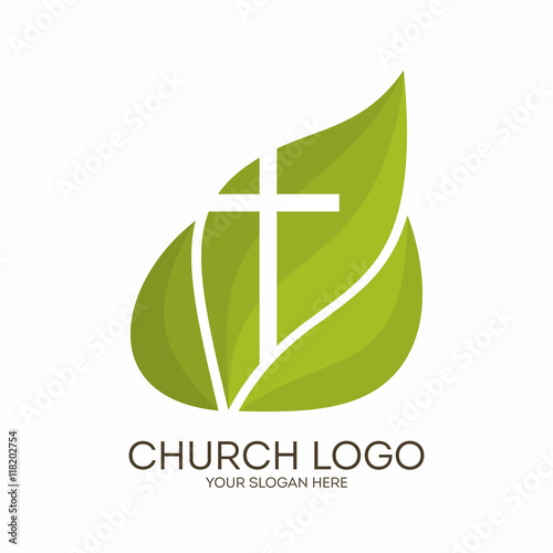 Church logo. Christian symbols. Cross on a background of green leaves