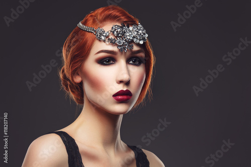 Beautiful girl with smoky eyes and red lips