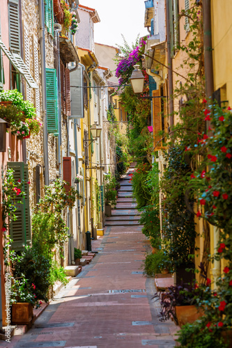 alley with entwined houses in Antibes, France photo