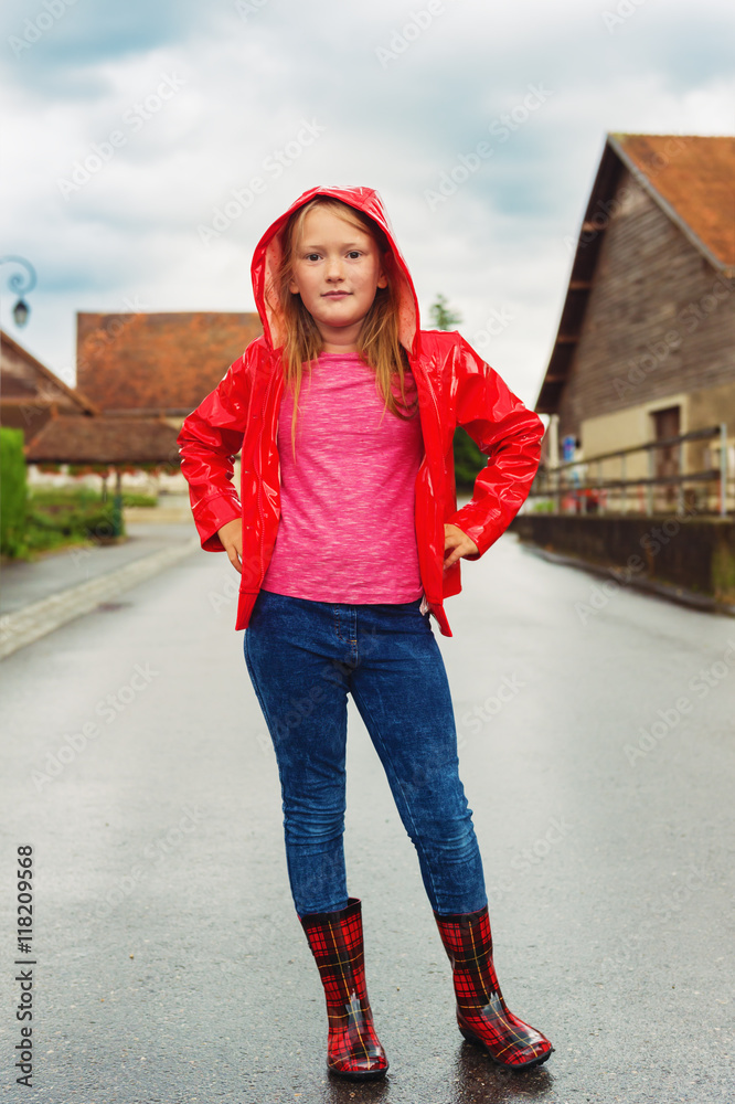 Vertical portrait of a cute little 7-8 year old girl wearing many  accessories Stock Photo by ©annanahabed 140816908