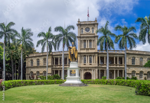 King Kamehameha I Statue in front of Ali iolani Hale, the Hawaii Supreme Court Building on King Street in Honolulu. photo