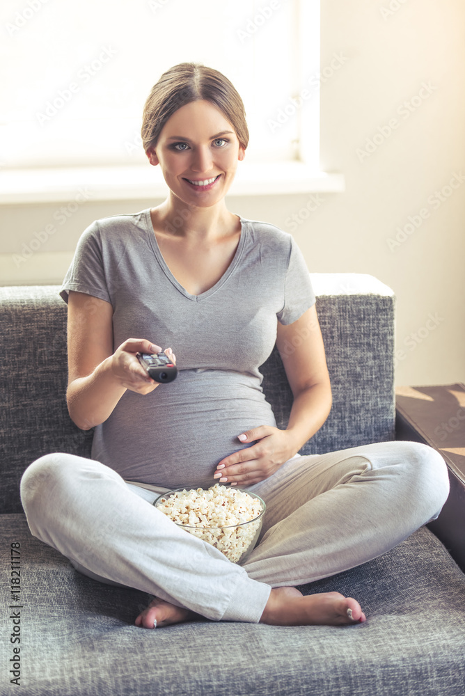 Beautiful pregnant woman at home