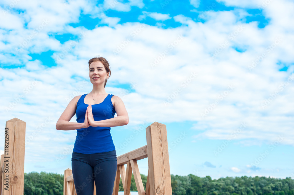 young woman practicing advanced yoga06