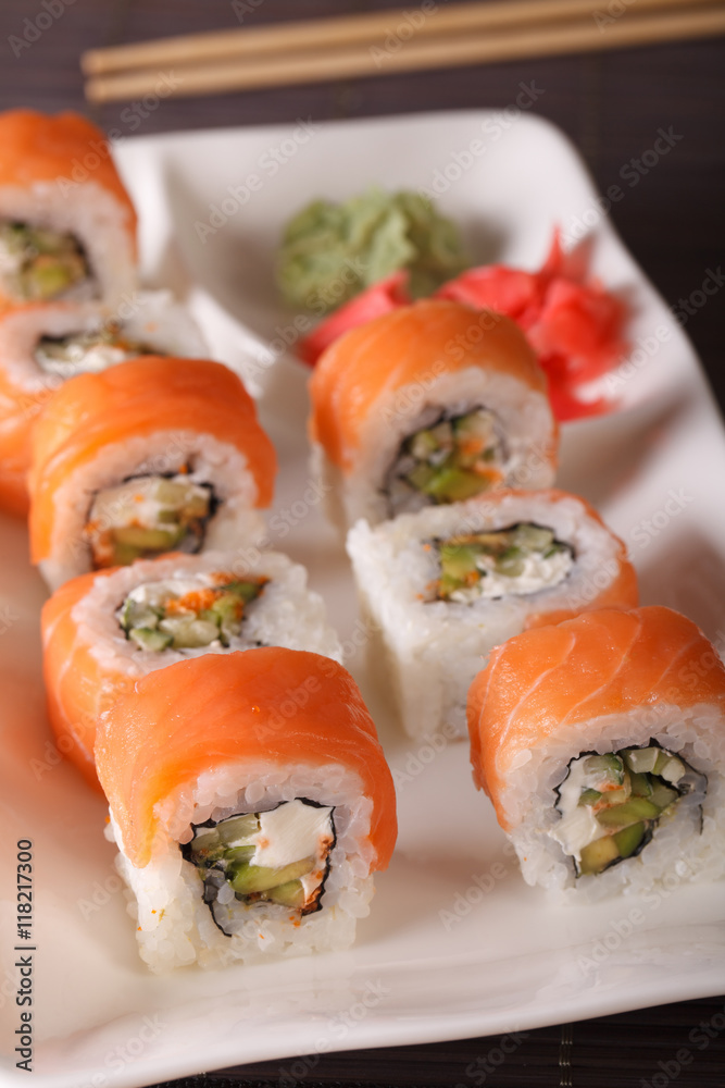 Roll Philadelphia with Fresh Salmon, Cream Cheese and Avocado. Vertical
Roll Philadelphia with Fresh Salmon, Cream Cheese and Avocado. Vertical