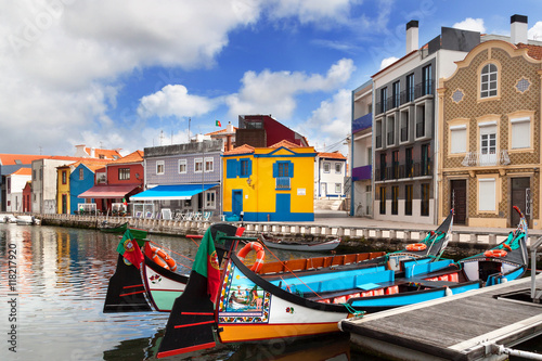 Moliceiro boats docked along central canal in Aveiro, Portugal