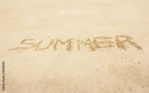 Summer Handwritten On Sand Summer Background Concept