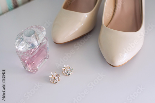 Bride's morning. Bride shoes, perfume and jewelry