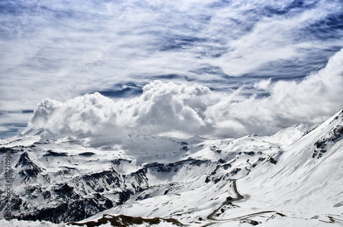 Beautiful view of Alps mountains. Snowy peaks in clouds. National Park Hohe Tauern  Austria.