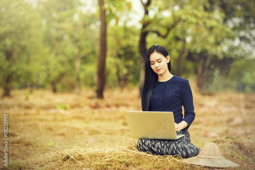 Young pretty business woman with notebook at outdoor