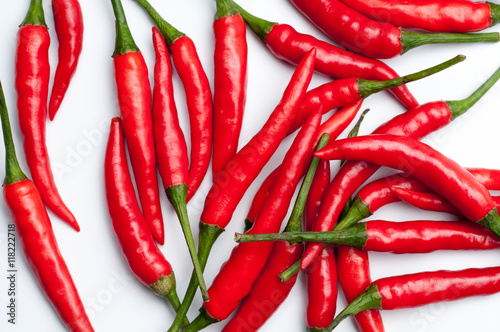 Red hot chili peppers on white background