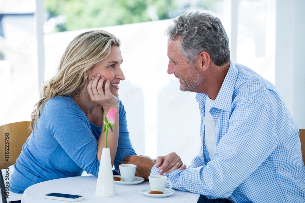 Fototapeta premium Romantic couple sitting at restaurant