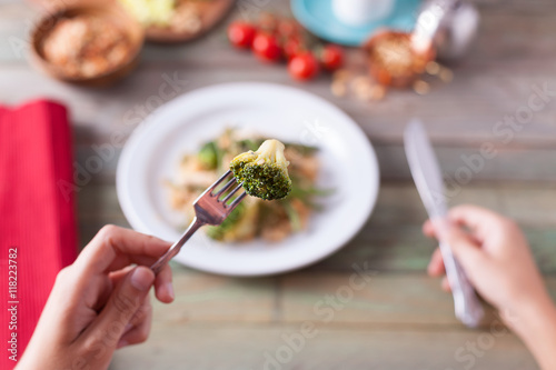 Having a healthy dinner with broccoli 