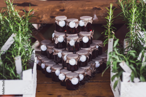 Set of handmade jars with jam on wedding