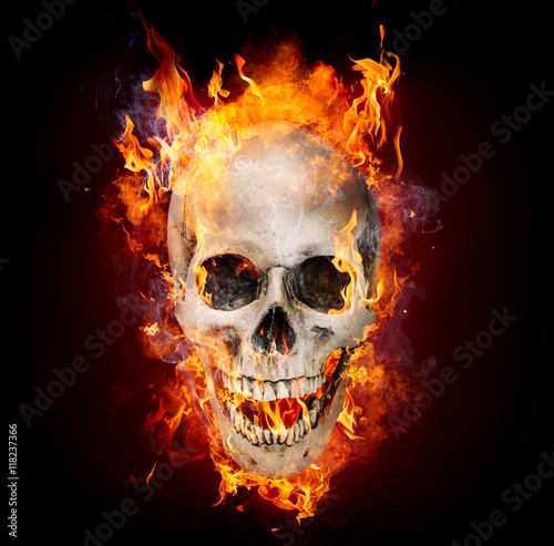 Satanic Skull In Flames In The Darkness
