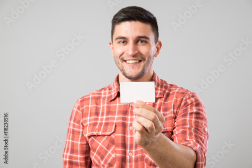 Man showing blank business card