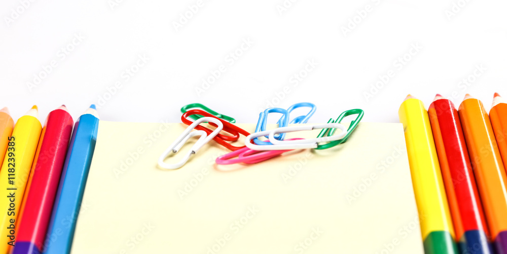 set of colored pencils and paper clips set of colored pencils and paper clips