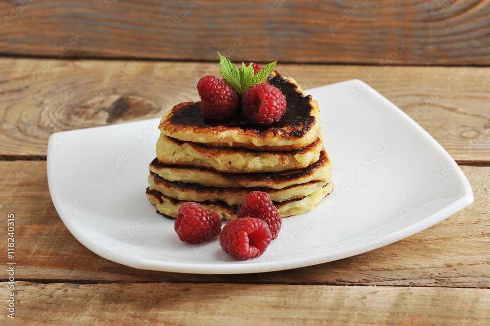 pancakes in the shape of hearts with raspberries pancakes in the shape of hearts with raspberries