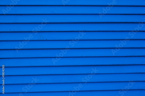 blue shuttered roll up metal door