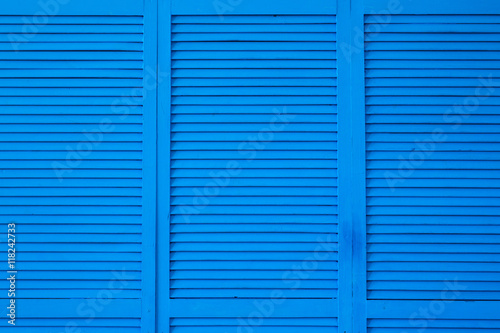 blue shuttered roll up metal door