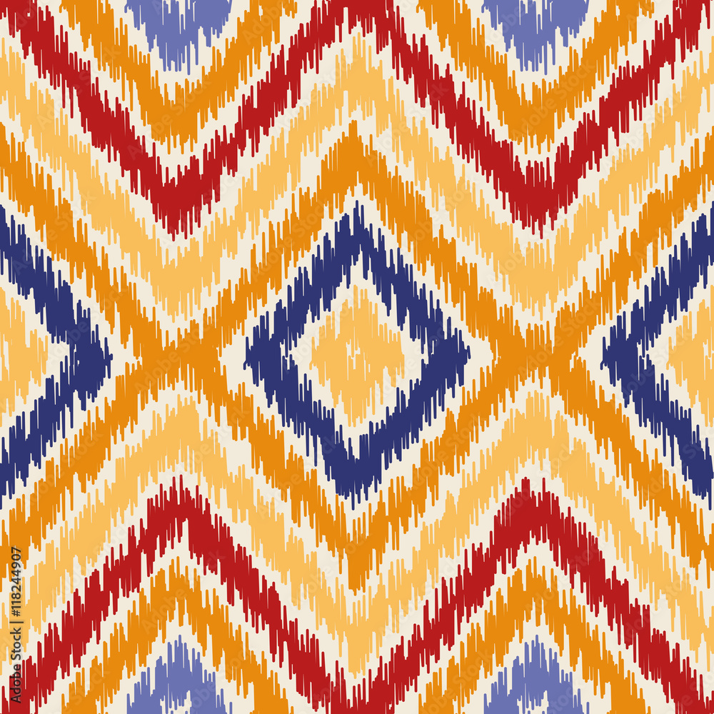 Ikat fabric pattern, abstract geometric pattern. . Seamless vector background.  Vector illustration. Oriental rug pattern, in yellow, orange and red. Colorful chevron background.