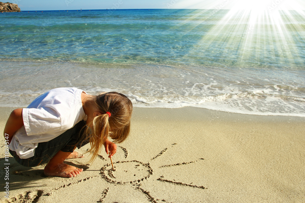 little girl in the sand on the beach Stock Photo | Adobe Stock
