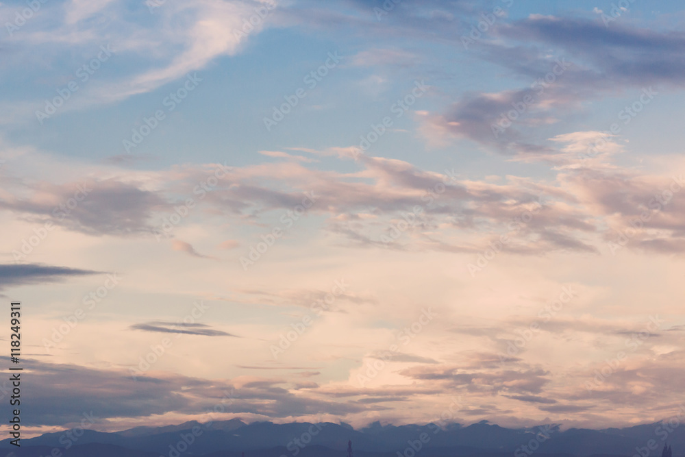 blue sky background with tiny clouds