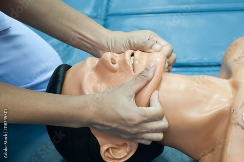 First aid CPR - clear airway © Kamon Wongnon