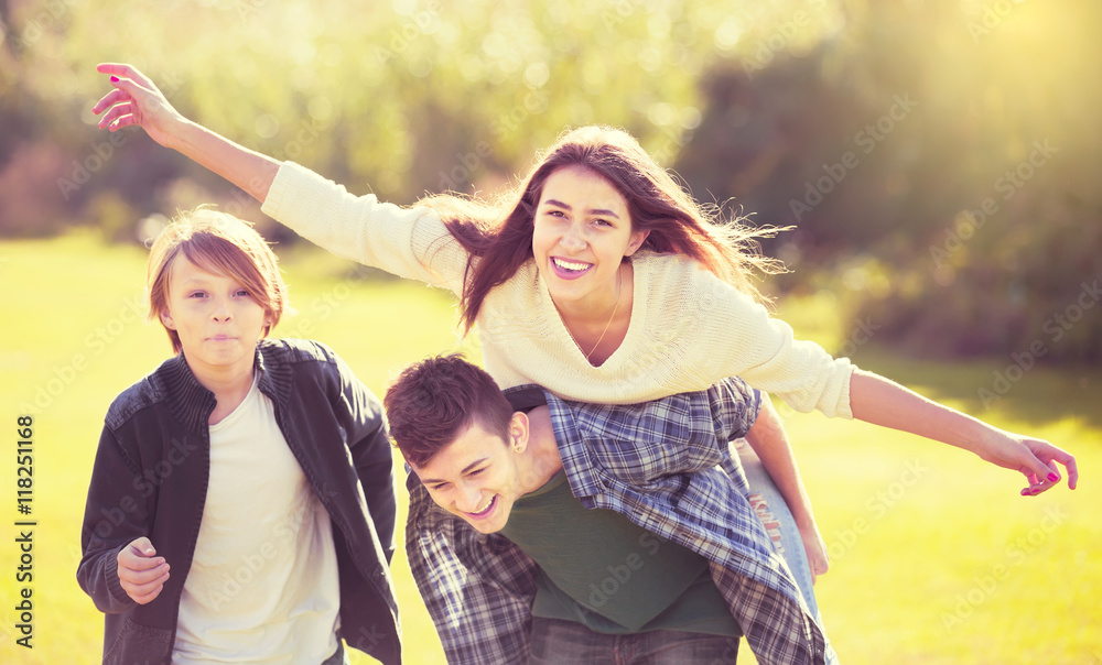Fototapeta premium Teenagers having fun outdoor
