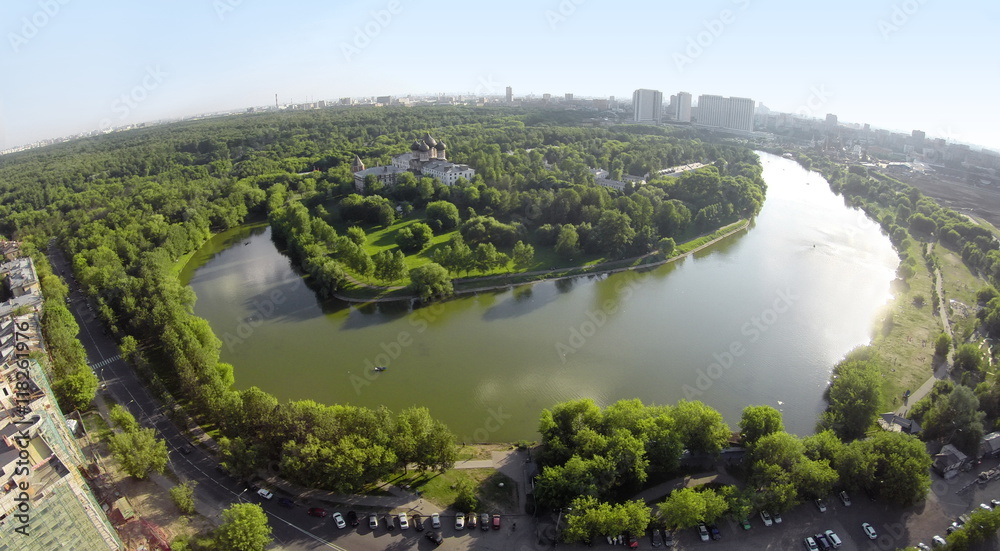 Cityscape with Cathedral of Intercession of Blessed Virgin Mary on lake island at spring sunny day. Aerial view.