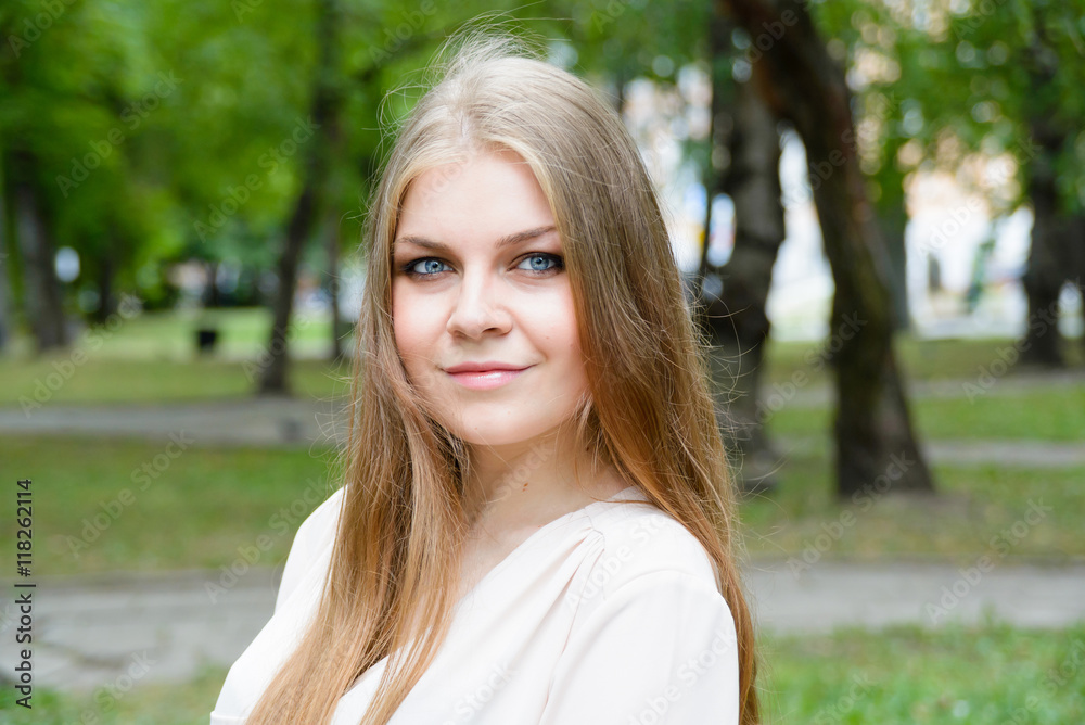 Portrait of beautiful blonde girl on the nature Portrait of beautiful blonde girl on the nature