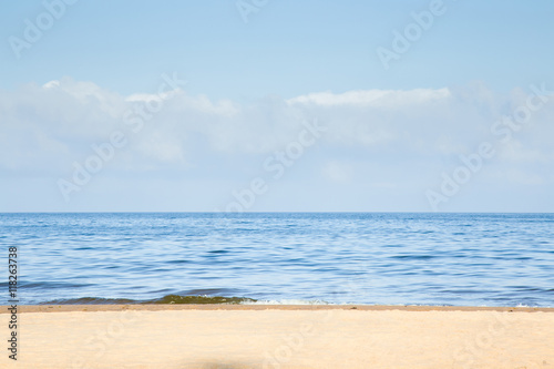 Fototapeta Naklejka Na Ścianę i Meble -  Sunny morning on empty sandy beach in summer