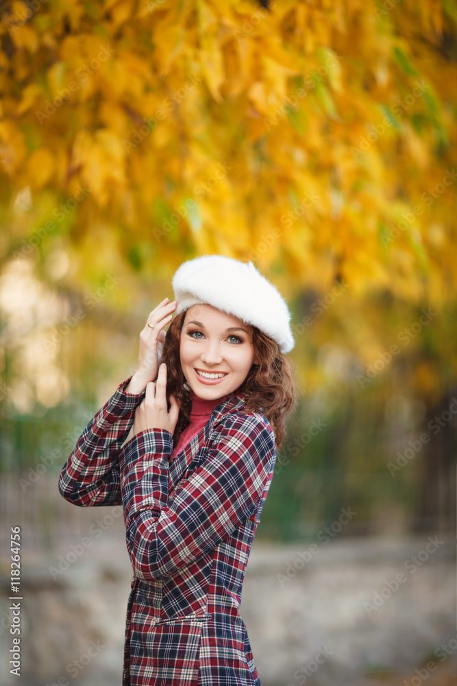 Beautiful young woman autumn outdoors , girl in knitted sweater Beautiful young woman autumn outdoors , girl in knitted sweater