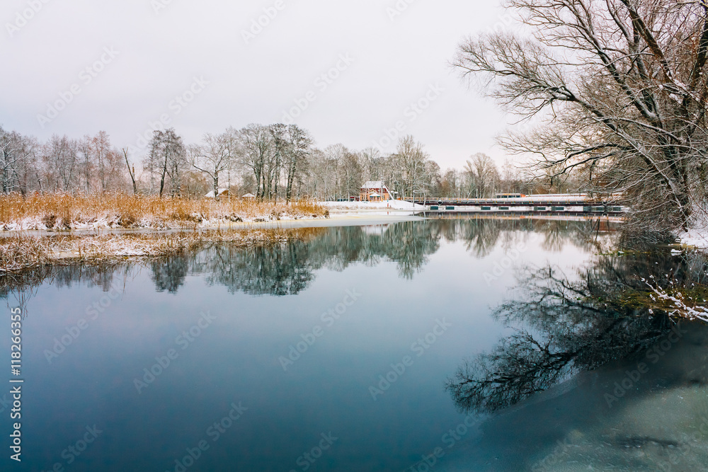Unfrozen Water Of Lake. Winter Landscape With Snow. Unfrozen Water Of Lake. Winter Landscape With Snow.