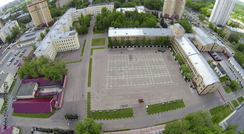 Foto Plateau near barracks of military units garrison of internal troops of Ministry of Home Affairs of Russian Federation at sunny day