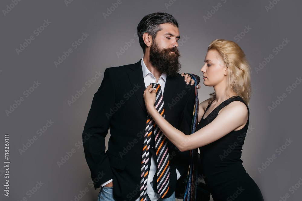 young couple with tie