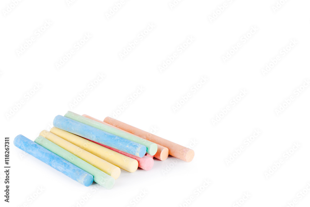 Colorful chalk on a white background.