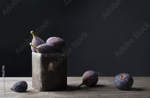Figs in jar on countertop photo