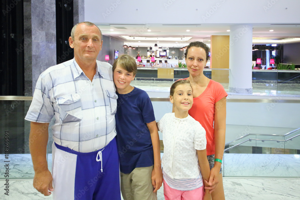 Obraz premium A woman and elderly man with boy and girl (with model release) in the vestibule of the Hotel Radisson Blu Paradise Resort and Spa