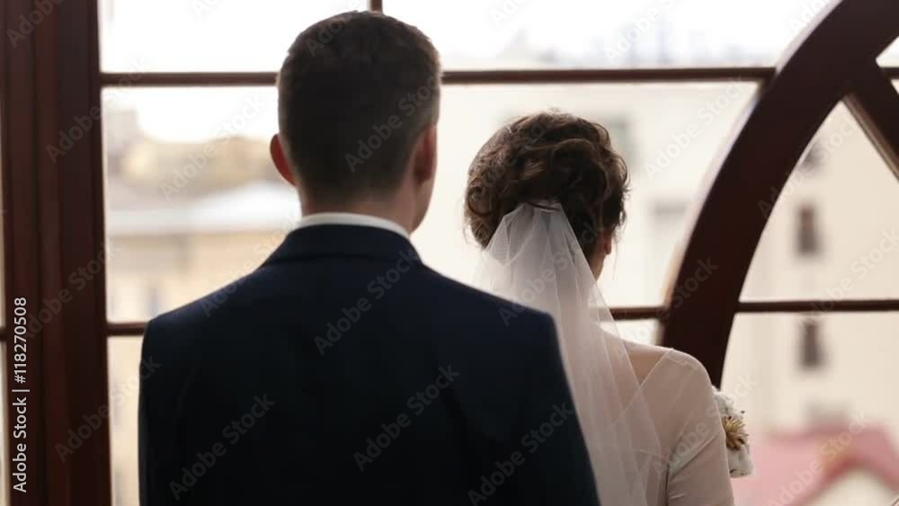 A beautiful bride and groom on their wedding day A beautiful bride and groom on their wedding day