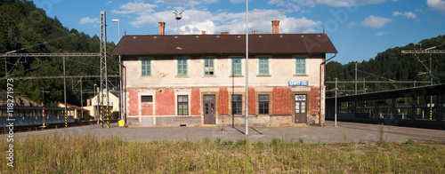 railway station in Usti nad Orlici in eastern Bohemia with historical railway station building, railway platform,, track and train photo