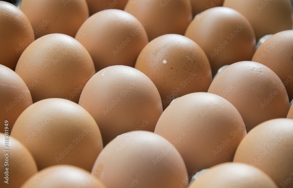 Eggs in cardboard, full frame .