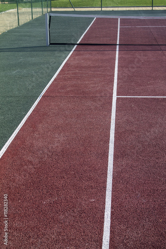 Tennis field with red and white lines © manuels1973