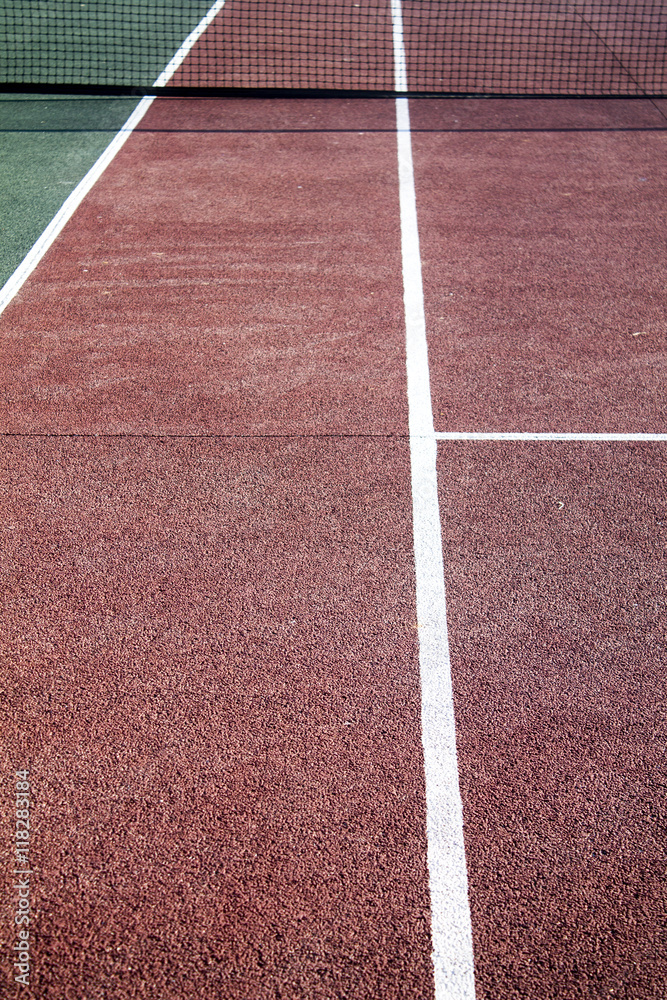 Tennis field with red and white lines